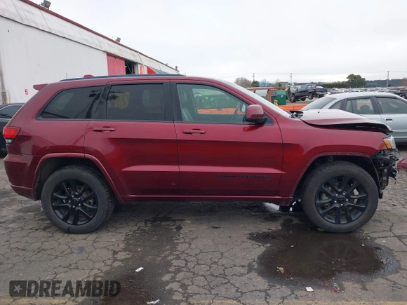 2018 Jeep Grand Cherokee Laredo E with VIN 1C4RJFAG6JC256341, listed as a IAAI auction lot 41635752 with 52,184 mi miles and . Bid and sale history available at DreamBid. Image 14.