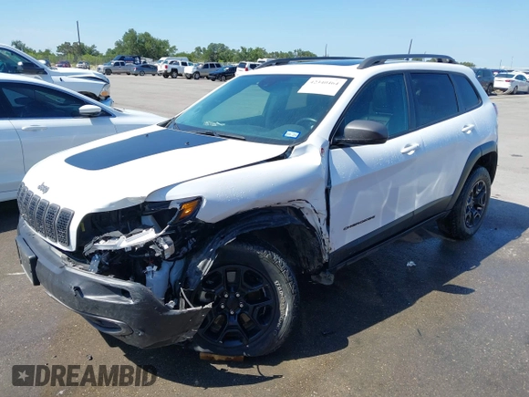 2021 Jeep Cherokee Trailhawk with VIN 1C4PJMBX1MD145169, listed as a IAAI auction lot 42340464 with 50,925 mi miles and . Bid and sale history available at DreamBid. Image 19.