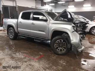 2021 Toyota Tacoma 4WD SR with VIN 3TYCZ5AN5MT023940, listed as a IAAI auction lot 41541896 with 46,209 mi miles. Bid and sale history available at carsss.com. Image 1.