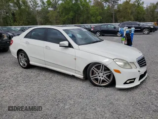 2010 Mercedes-Benz E 550 Luxury with VIN WDDHF7CB3AA134560, listed as a Copart auction lot 48516615 with 165,533 mi miles and Salvage Title. Bid and sale history available at DreamBid. Image 4.