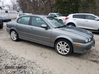 2004 Jaguar X-Type with VIN SAJEA51C24WE00125, listed as a Copart auction lot 49161875 with 80,890 mi miles and Clean Title. Bid and sale history available at DreamBid. Image 4.