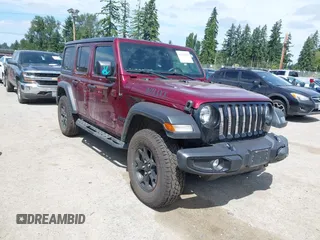 2021 Jeep Wrangler Unlimited Willys with VIN 1C4HJXDG0MW664088, listed as a IAAI auction lot 42618549 with 49,394 mi miles and . Bid and sale history available at DreamBid. Image 1.
