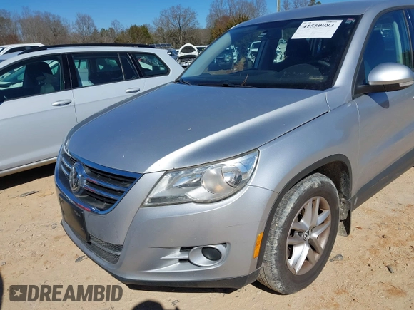 2011 Volkswagen Tiguan SE with VIN WVGBV7AX5BW549090, listed as a IAAI auction lot 41550983 with 153,739 mi miles and . Bid and sale history available at DreamBid. Image 6.