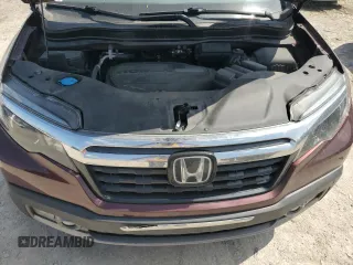2019 Honda Ridgeline RTL-E with VIN 5FPYK3F71KB002046, listed as a Copart auction lot 61934455 with 131,674 mi miles and Salvage title. Bid and sale history available at DreamBid. Image 11.