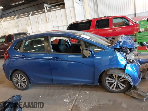 2015 Honda Fit EX-L with VIN 3HGGK5H8XFM762257, listed as a IAAI auction lot 42398067 with Not provided miles and . Bid and sale history available at DreamBid. Image 14.