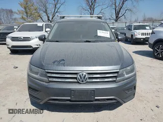 2018 Volkswagen Tiguan S with VIN 3VV0B7AX7JM104662, listed as a IAAI auction lot 41781658 with 235,461 mi miles and . Bid and sale history available at DreamBid. Image 13.