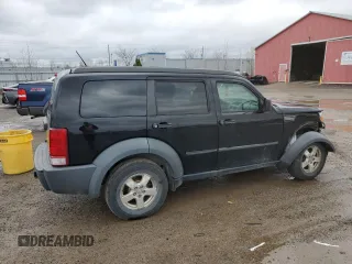 2007 Dodge Nitro SXT z VIN 1D8GU28K07W555205, wystawiony jako Copart lot #81165584 z przebiegiem 206 499 mil mil oraz Szkoda całkowita • Salvage title. Historia ofert i sprzedaży dostępna na DreamBid. Obrazek 3.