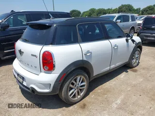 2014 MINI Countryman S with VIN WMWZC3C54EWP27859, listed as a IAAI auction lot 39592610 with 105,264 mi miles and . Bid and sale history available at DreamBid. Image 4.