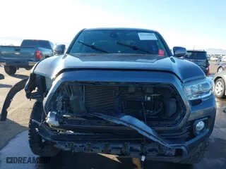 2018 Toyota Tacoma SR5 with VIN 3TMAZ5CN4JM069528, listed as a IAAI auction lot 41264860 with 66,776 mi miles. Bid and sale history available at carsss.com. Image 12.