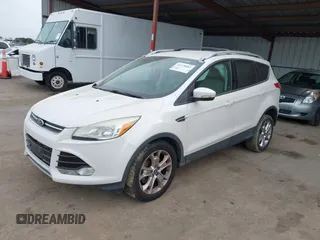 2013 Ford Escape SEL with VIN 1FMCU0H99DUB83641, listed as a IAAI auction lot 41578882 with 124,872 mi miles. Bid and sale history available at carsss.com. Image 17.