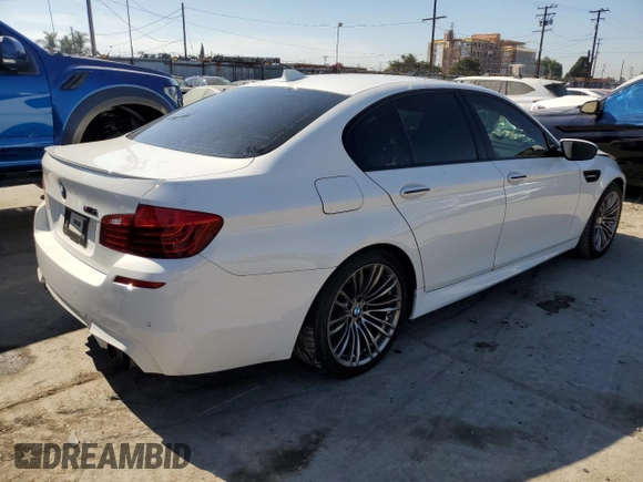 2014 BMW M5 with VIN WBSFV9C57ED097570, listed as a Copart auction lot 88571785 with 100,391 mi miles and Salvage Title. Bid and sale history available at carsss.com. Image 3.