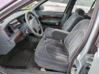 1996 Mercury Grand Marquis GS with VIN 2MELM74W5TX653873, listed as a Copart auction lot 74659254 with 86,589 mi miles and Salvage Title. Bid and sale history available at DreamBid. Image 7.