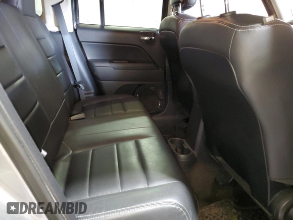 2015 Jeep Patriot High Altitude with VIN 1C4NJRFB4FD370708, listed as a Copart auction lot 51512525 with 136,743 mi miles and Salvage Title. Bid and sale history available at carsss.com. Image 11.