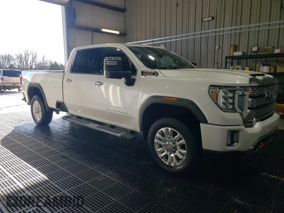 2020 GMC Sierra 3500HD Denali z VIN 1GT49WEY2LF317238, wystawiony jako Copart lot #51967295 z przebiegiem 125 681 mil mil oraz Szkody całkowita. Historia ofert i sprzedaży dostępna na DreamBid. Obrazek 4.