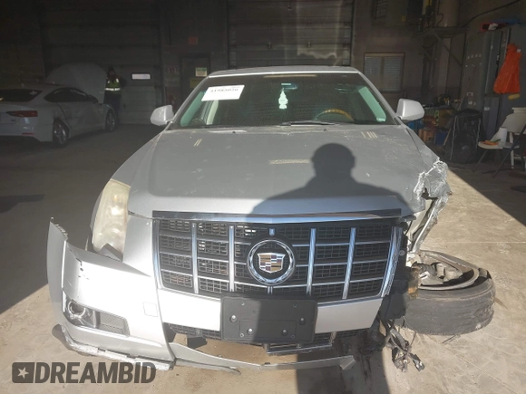 2012 Cadillac CTS Premium z VIN 1G6DS5E33C0139591, wystawiony jako IAAI lot #41985026 z przebiegiem 151 810 mil mil oraz . Historia ofert i sprzedaży dostępna na DreamBid. Obrazek 12.