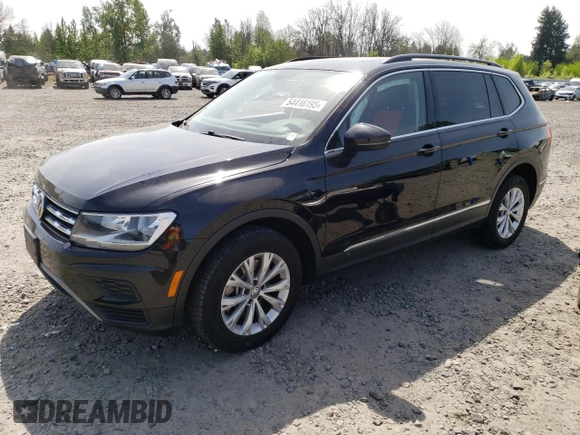 2018 Volkswagen Tiguan SEL z VIN 3VV2B7AX7JM119297, wystawiony jako Copart lot #54416195 z przebiegiem 51 972 mil mil oraz Szkoda całkowita • Salvage title. Historia ofert i sprzedaży dostępna na DreamBid. Obrazek 1.
