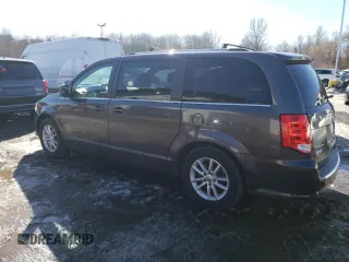2018 Dodge Grand Caravan SXT with VIN 2C4RDGCGXJR325632, listed as a Copart auction lot 46326655 with 128,692 mi miles and Clean Title. Bid and sale history available at DreamBid. Image 2.