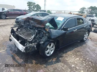 2010 Acura TSX with VIN JH4CU2F67AC016221, listed as a IAAI auction lot 42405766 with Not provided miles and . Bid and sale history available at DreamBid. Image 2.