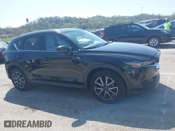 2018 Mazda CX-5 Grand Touring with VIN JM3KFADM2J1324547, listed as a IAAI auction lot 41947497 with 66,254 mi miles. Bid and sale history available at carsss.com. Image 13.