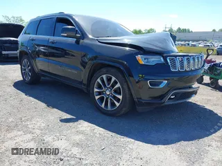 2017 Jeep Grand Cherokee Overland z VIN 1C4RJFCG0HC844713, wystawiony jako IAAI lot #42293301 z przebiegiem 83 791 mil mil oraz . Historia ofert i sprzedaży dostępna na DreamBid. Obrazek 1.