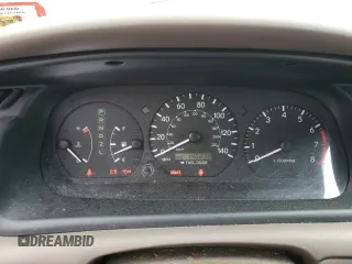 2000 Toyota Camry CE z VIN 4T1BG22K4YU977012, wystawiony jako Copart lot #59085085 z przebiegiem 146 838 mil mil oraz Szkoda całkowita • Salvage title. Historia ofert i sprzedaży dostępna na DreamBid. Obrazek 9.
