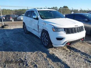 2017 Jeep Grand Cherokee Overland with VIN 1C4RJFCG8HC641729, listed as a IAAI auction lot 41233125 with 116,874 mi miles. Bid and sale history available at carsss.com. Image 1.