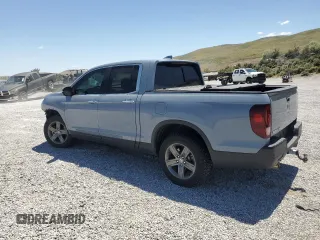 2022 Honda Ridgeline RTL-E with VIN 5FPYK3F79NB024459, listed as a Copart auction lot 59165445 with 21,429 mi miles and Salvage title. Bid and sale history available at DreamBid. Image 2.