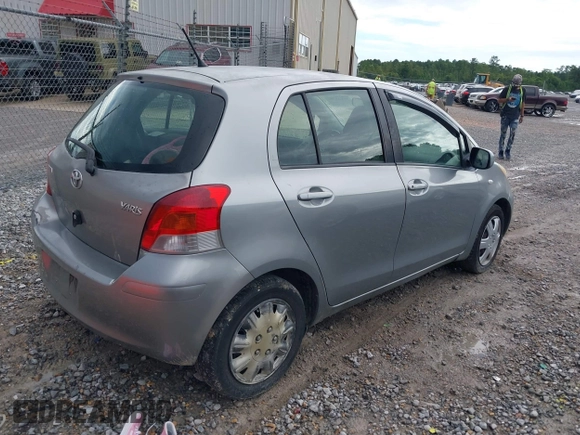 2010 Toyota Yaris with VIN JTDKT4K37A5281975, listed as a IAAI auction lot 39843782 with 257,802 mi miles. Bid and sale history available at carsss.com. Image 4.