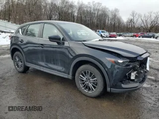 2019 Mazda CX-5 Sport with VIN JM3KFBBM7K0633737, listed as a Copart auction lot 45170645 with 76,023 mi miles and Salvage Title. Bid and sale history available at DreamBid. Image 4.
