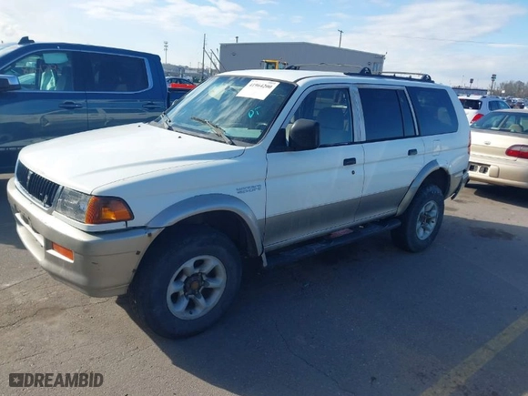 1997 Mitsubishi Montero Sport LS with VIN JA4MT31P2VP019597, listed as a IAAI auction lot 41964200 with 1 miles. Bid and sale history available at carsss.com. Image 2.