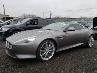 2015 Aston Martin DB9 z VIN SCFFDAEM9FGA16279, wystawiony jako Copart lot #81886554 z przebiegiem 25 029 mil mil oraz Szkody całkowita. Historia ofert i sprzedaży dostępna na DreamBid. Obrazek 1.