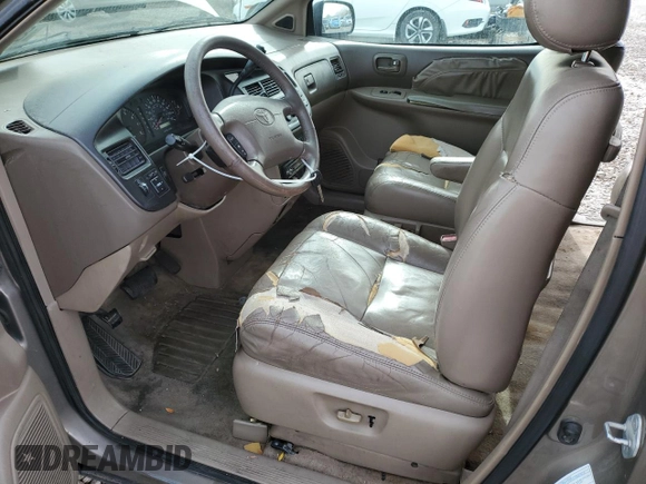 1999 Toyota Sienna LE with VIN 4T3ZF13C7XU133135, listed as a Copart auction lot 80618034 with 200,910 mi miles and Salvage Title. Bid and sale history available at carsss.com. Image 7.
