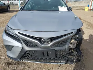 2020 Toyota Camry SE with VIN 4T1M11AK2LU869485, listed as a IAAI auction lot 41593137 with 90,501 mi miles. Bid and sale history available at carsss.com. Image 6.