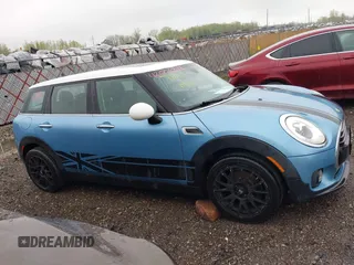 2017 MINI Clubman Cooper z VIN WMWLN5C56H2E32370, wystawiony jako IAAI lot #42159911 z przebiegiem 134 375 mil mil oraz . Historia ofert i sprzedaży dostępna na DreamBid. Obrazek 13.
