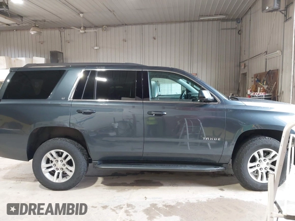2020 Chevrolet Tahoe LT with VIN 1GNSKBKC3LR161181, listed as a IAAI auction lot 42536094 with 129,939 mi miles and . Bid and sale history available at DreamBid. Image 13.