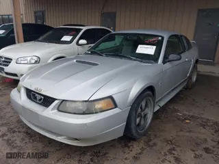 2001 Ford Mustang Standard with VIN 1FAFP40411F232997, listed as a IAAI auction lot 41560523 with 234,743 mi miles. Bid and sale history available at carsss.com. Image 2.