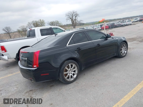 2008 Cadillac CTS AWD w/1SA with VIN 1G6DG577080180639, listed as a IAAI auction lot 42128238 with 141,133 mi miles. Bid and sale history available at carsss.com. Image 4.