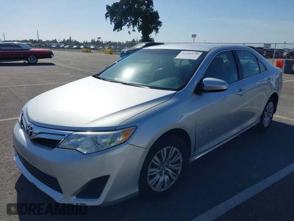 2014 Toyota Camry L with VIN 4T4BF1FK5ER442960, listed as a IAAI auction lot 42206639 with 119,639 mi miles and . Bid and sale history available at DreamBid. Image 2.