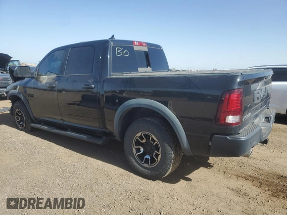 2017 Ram 1500 Rebel z VIN 1C6RR7YT3HS589170, wystawiony jako Copart lot #57115335 z przebiegiem 53 389 mil mil oraz Szkoda całkowita • Salvage title. Historia ofert i sprzedaży dostępna na DreamBid. Obrazek 2.