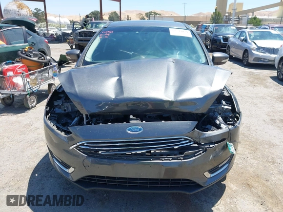 2018 Ford Focus Titanium with VIN 1FADP3N28JL232120, listed as a IAAI auction lot 42544070 with 28,661 mi miles and . Bid and sale history available at DreamBid. Image 13.