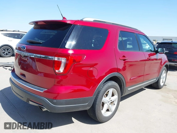 2018 Ford Explorer XLT with VIN 1FM5K7D87JGA31095, listed as a IAAI auction lot 41858003 with 115,219 mi miles and . Bid and sale history available at DreamBid. Image 4.