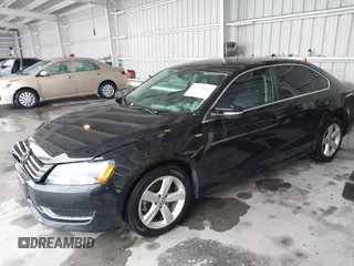 2014 Volkswagen Passat S with VIN 1VWAT7A37EC035831, listed as a IAAI auction lot 42648263 with 118,081 mi miles and . Bid and sale history available at DreamBid. Image 17.