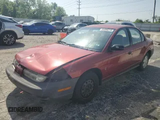 1999 Saturn SL z VIN 1G8ZH5288XZ273509, wystawiony jako Copart lot #55508215 z przebiegiem 168 946 mil mil oraz Szkoda całkowita • Salvage title. Historia ofert i sprzedaży dostępna na DreamBid. Obrazek 1.