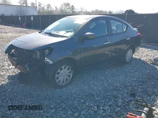 2015 Nissan Versa SV with VIN 3N1CN7AP6FL827678, listed as a IAAI auction lot 41422007 with 164,141 mi miles. Bid and sale history available at carsss.com. Image 2.