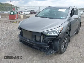 2017 Hyundai Santa Fe Ultimate z VIN 5XYZWDLA4HG441962, wystawiony jako IAAI lot #42144550 z przebiegiem 124 627 mil mil oraz . Historia ofert i sprzedaży dostępna na DreamBid. Obrazek 6.