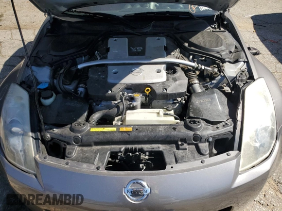 2007 Nissan 350Z Touring z VIN JN1BZ36A17M651353, wystawiony jako Copart lot #46220605 z przebiegiem 56 013 mil mil oraz Czysty tytuł • Clean title. Historia ofert i sprzedaży dostępna na DreamBid. Obrazek 11.