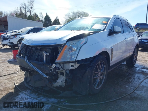 2014 Cadillac SRX Performance Collection with VIN 3GYFNCE31ES646075, listed as a IAAI auction lot 41856378 with 172,379 mi miles. Bid and sale history available at carsss.com. Image 18.