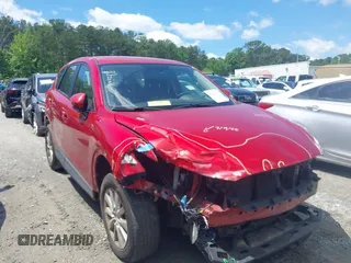 2015 Mazda CX-5 Sport with VIN JM3KE2BE3F0551893, listed as a IAAI auction lot 42324187 with 61,428 mi miles and . Bid and sale history available at DreamBid. Image 1.