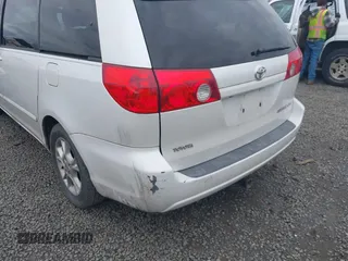 2006 Toyota Sienna XLE with VIN 5TDZA22C76S419699, listed as a IAAI auction lot 41834955 with 180,621 mi miles. Bid and sale history available at carsss.com. Image 6.
