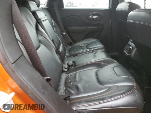 2015 Jeep Cherokee Trailhawk z VIN 1C4PJMBS7FW704980, wystawiony jako Copart lot #70334472 z przebiegiem 127 562 mil mil oraz Szkoda całkowita • Salvage title. Historia ofert i sprzedaży dostępna na DreamBid. Obrazek 11.